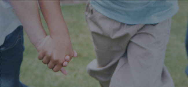 photo image of two people holding hands